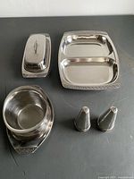 All six stainless steel pieces on tabletop