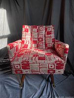 Front view of upholstered swivel armchair