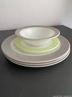 Stack of all five pieces showing rims and sizes