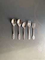 All five pieces laid out to show types and relative sizes