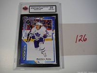 Front of graded Matthew Knies rookie card showing grade label and card front