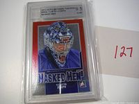 Full view of encapsulated graded Curtis Joseph Masked Men 6 card
