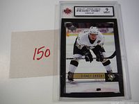 Front view of graded Sidney Crosby #199 checklist card slab showing grade 9 Mint