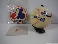 Pinback button in sleeve and baseball radio front view