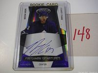 Front of Nazem Kadri rookie card showing autograph and holographic design