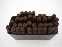 Top view of entire punch set in holder