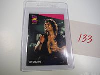 Front of Ozzy Osbourne trading card in top-loader