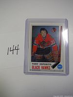 Front of Tony Esposito 25th Anniversary Series hockey card in plastic case
