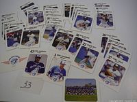 Spread of majority of cards showing fronts and numbering