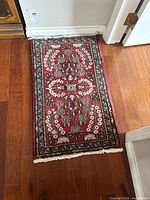 Full view of the rug on hardwood floor