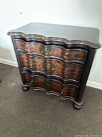 Front and side view of painted three-drawer dresser