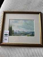 Frontal view of framed watercolour with mat and frame