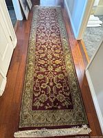 Full view of runner rug in hallway