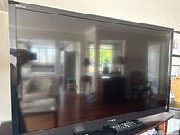 Front view of Sony 46-inch TV on stand
