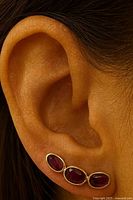 Earring worn on ear showing size and placement