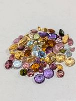 loose multicolour gemstones spread out