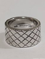 Front view of wide band sterling silver lattice ring