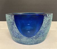 Front view showing textured exterior and smooth cobalt interior