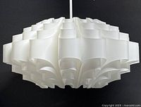 Pendant light unlit showing full sculptural form