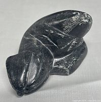 Front angled view of soapstone seal sculpture