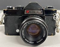 Front view of GAF L-CS camera with Chinon 55mm lens attached