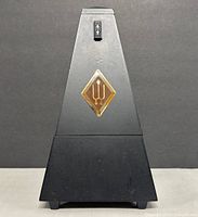 Front view of Wittner metronome with logo emblem
