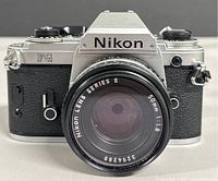 Front view showing Nikon FG body with Series E 50 mm lens attached