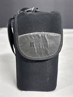 Ricoh branded black nylon camera case front view