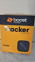 Front of sealed Boost Mobile Tracker Safe & Found retail box