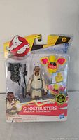 Front of sealed Winston Zeddemore action figure package showing figure and accessories