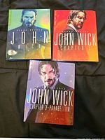 Front covers of all three John Wick Blu-ray cases