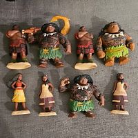 Eight Disney Moana figurines arranged in two rows showing all items