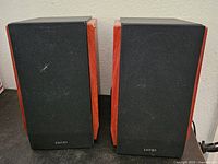 Front view of both Edifier R1700BT speakers with grilles on