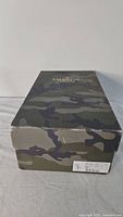 Closed camouflage print Valentino shoe box