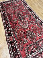 Angled view highlighting central floral motifs and colour palette