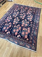 Full top view of Sirjan wool rug showing pattern and colours