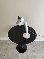 Front angled view of entire lamp on table