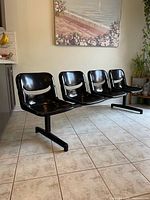 front angled view of the four-seat bench