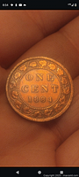 Reverse of 1884 Canadian large cent showing denomination and date