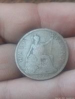 Reverse showing seated Britannia, date 1928, HALF PENNY legend