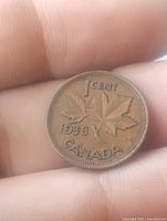 Reverse showing 1938 date, maple leaf design and denomination
