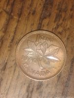 Reverse of 1 cent coin dated 1940 with maple leaves