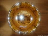 Front view showing full plate design and condition