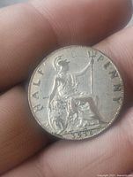 Reverse of 1916 half penny showing Britannia, denomination, date