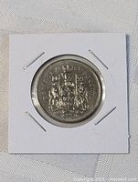 Reverse of 1981 Canada 50-cent coin in holder