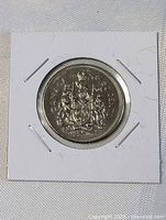 Reverse of 1968 Canada 50-cent coin in 2x2 holder