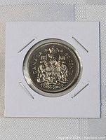Obverse view of 1968 Canada 50-cent coin in 2x2 holder