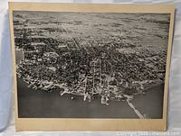 Entire mounted photograph showing aerial view