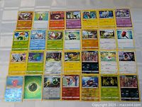 Overview of full 25-card lot laid out in five-by-five grid