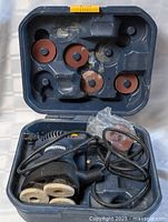 Orbital sander and discs in open carry case